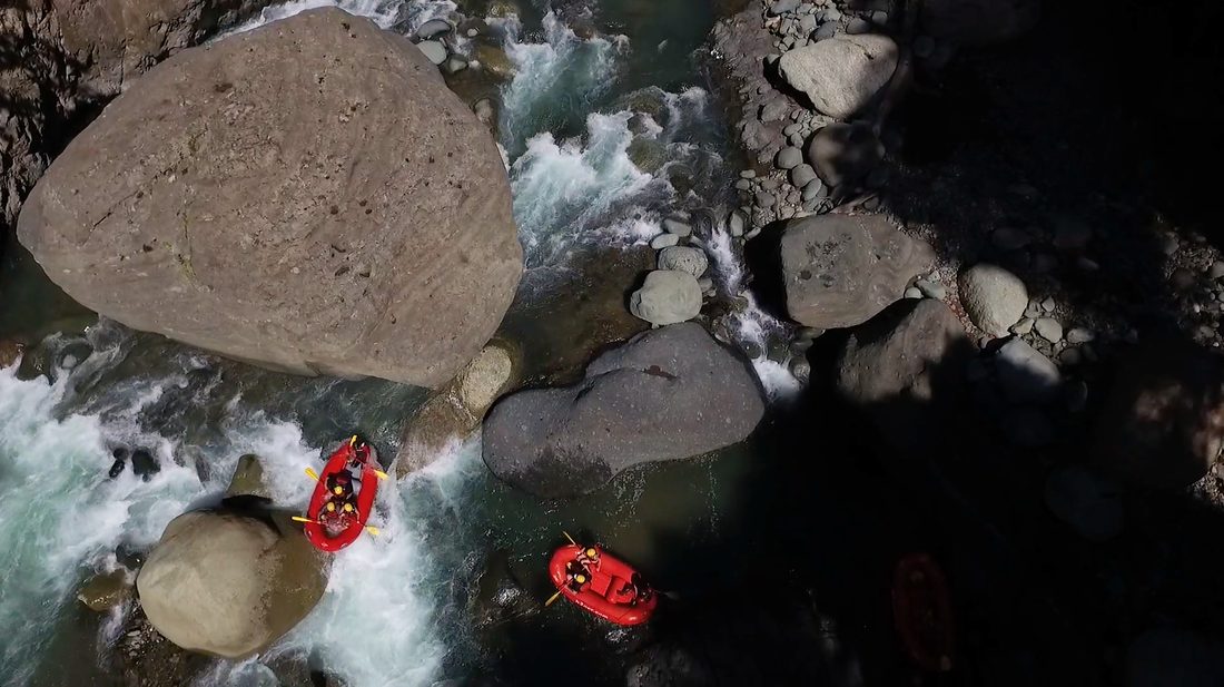 Rafts in the rapid called The Dragon, seen from above